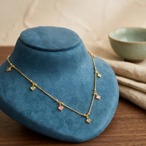 F1ZCjMVwAX Elegant Pastel Gemstone Station Necklace - Image 1